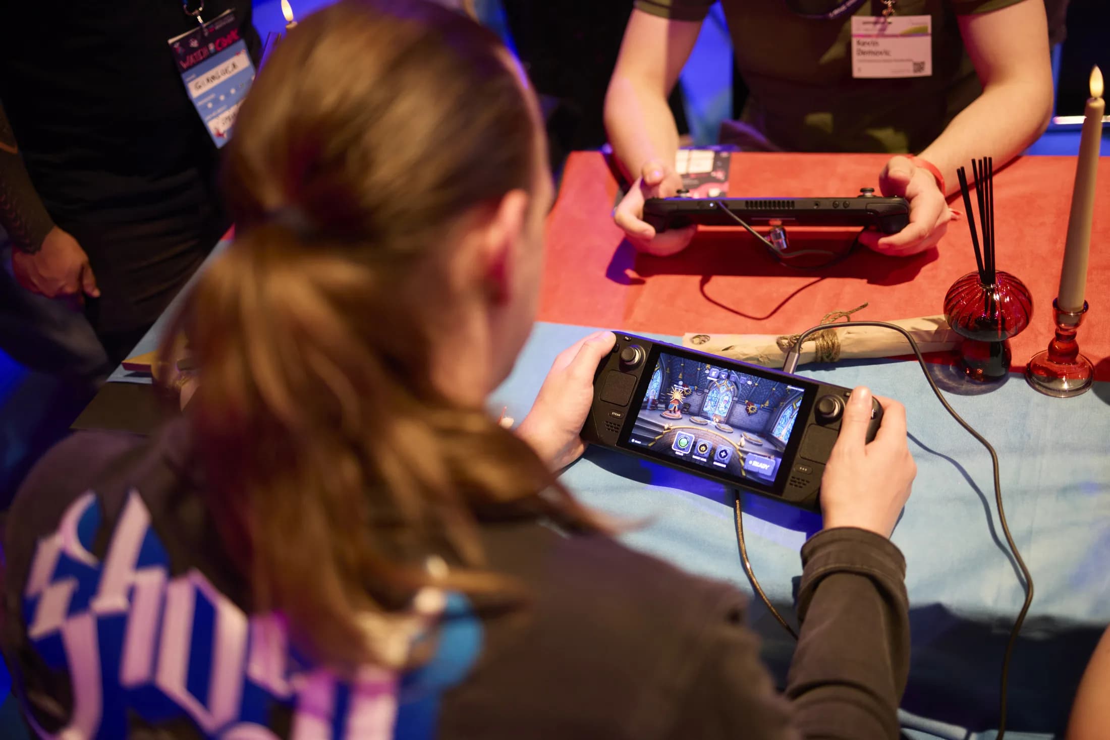 A guest playing an indie game at gamescom 2025