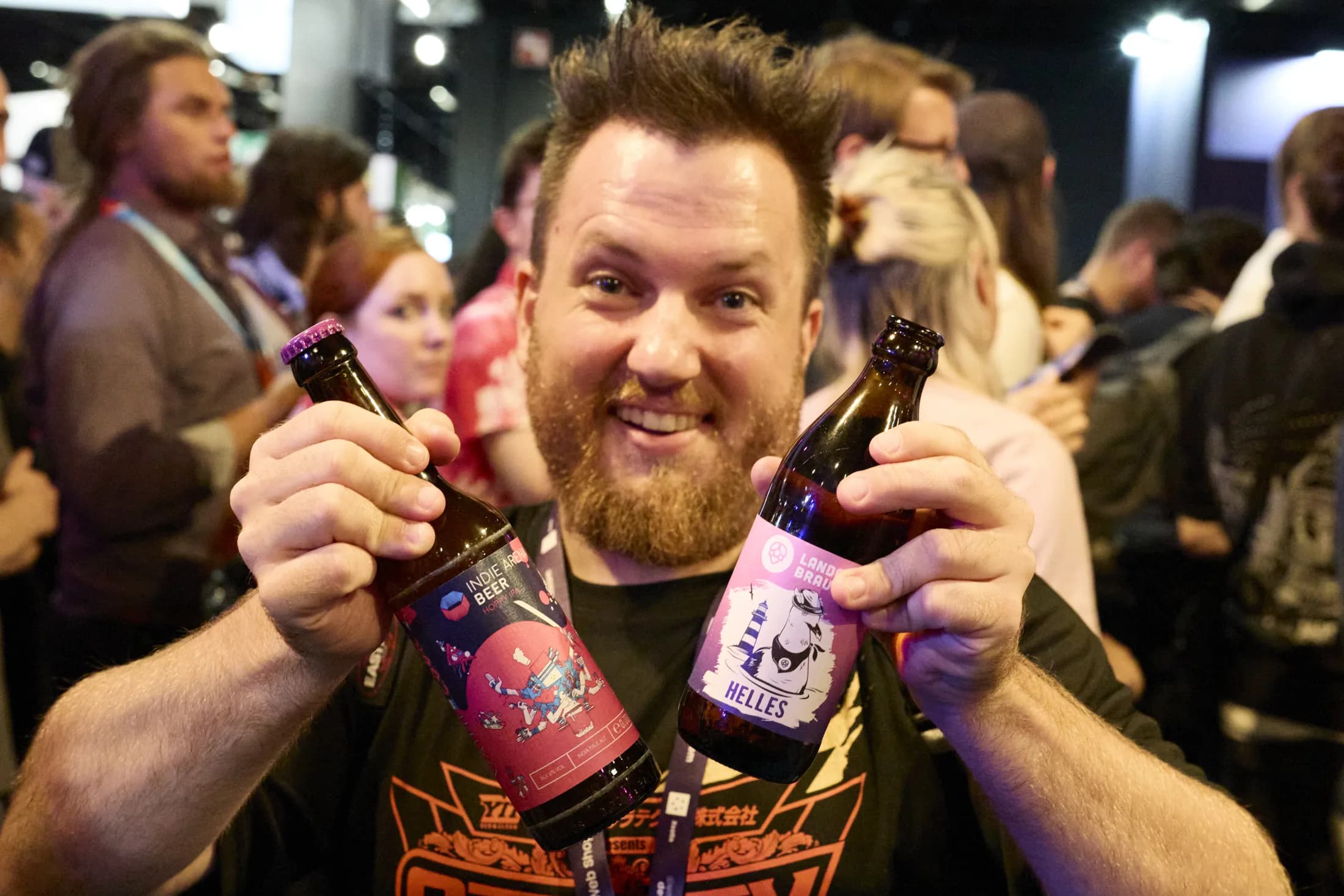 A reception guest holding two event drinks in 2025