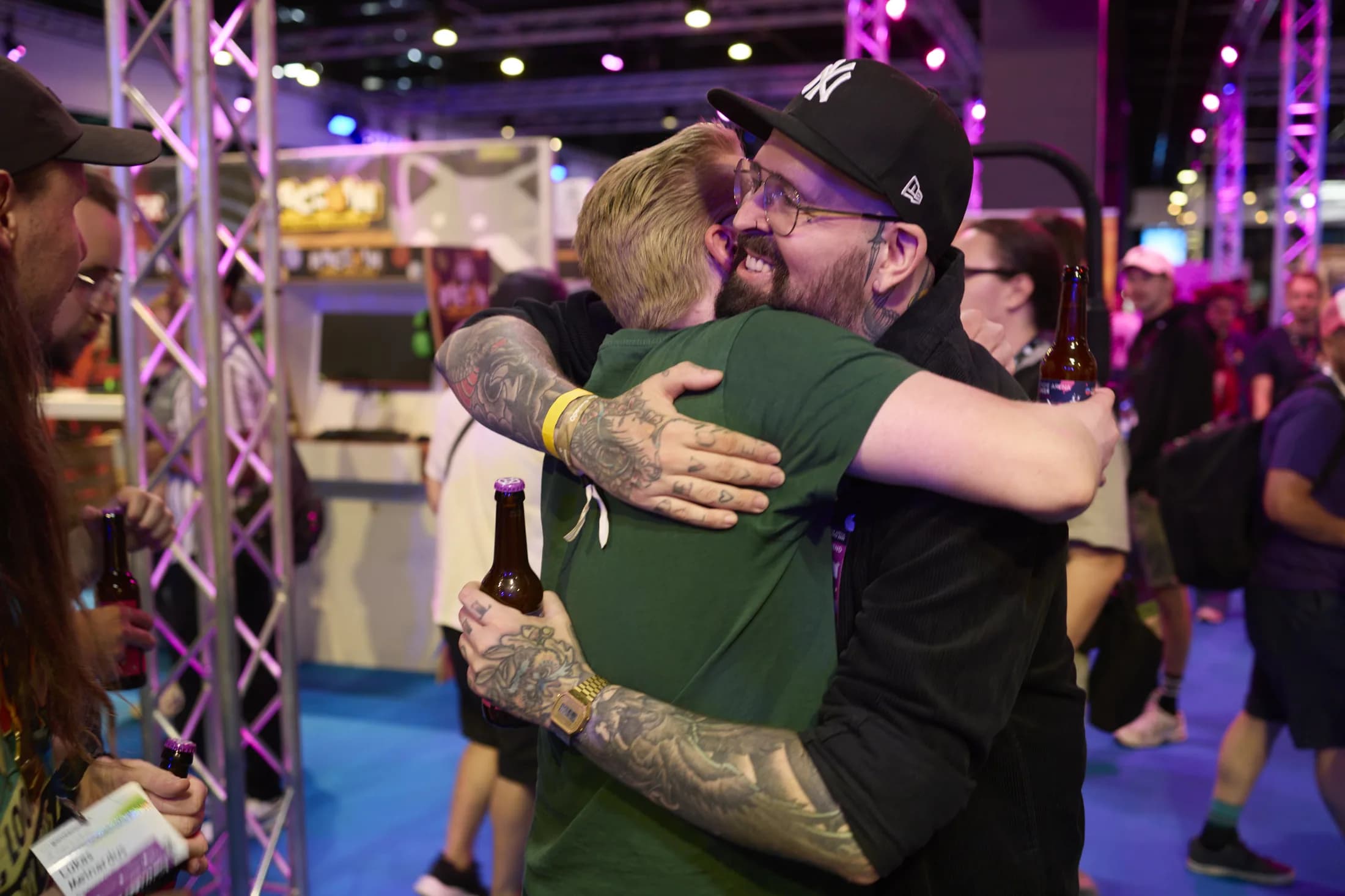 Two guests greeting each other at the 2025 reception